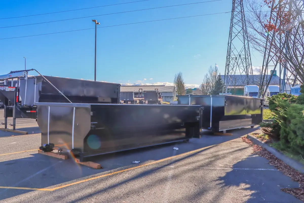 Roll-off dumpster ready for waste disposal at job site for Concrete Dumpster Rental in Hazleton